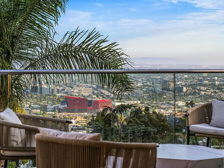 Sweeping views of the Los Angeles skyline from the home's elevated vantage point.