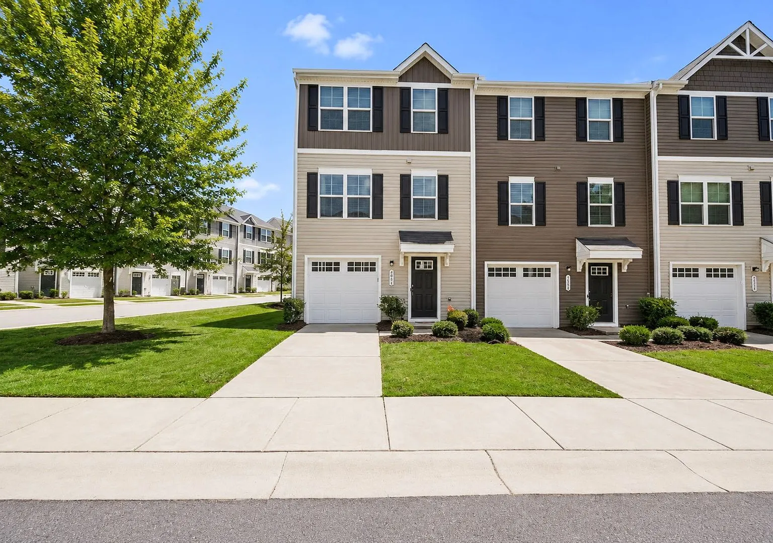 3-Story Charlotte Townhome | 3BR, Garage, Fenced Yard & Lawn Care Included! — Photo 1