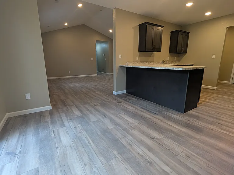 Eating Bar/Counter- Room for your bar stools plus Dining Area