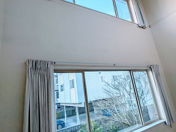 Huge windows and natural light make the space feel quite large