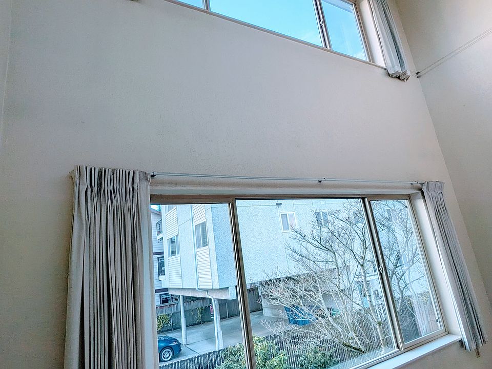 Huge windows and natural light make the space feel quite large