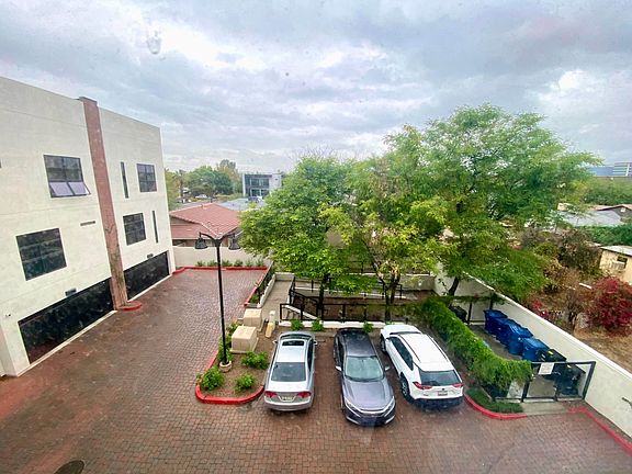Courtyard parking and doggy relief area