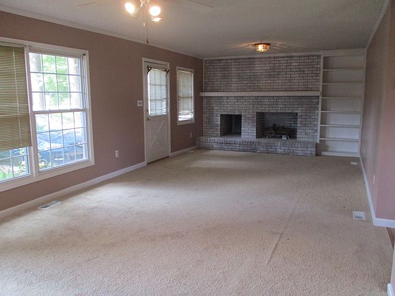 One view of Living/Main room. Non-functioning fireplace.