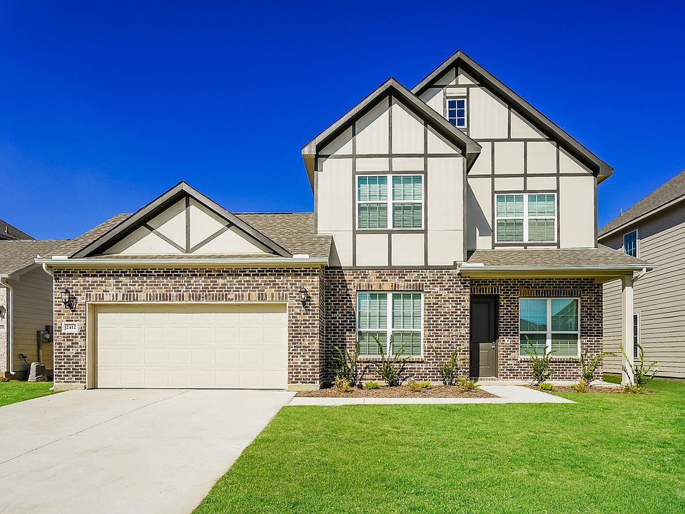 exterior of single family home with attached garage and driveway