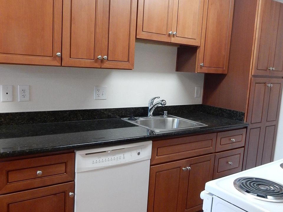 Remodeled kitchen with floor to ceiling pantry, dishwasher