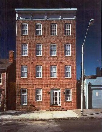 Singular and unique historic Fells Point Award Winning Apartment Building Masonary with Fire Sprinkler System and Central Station Alarm Fully Gated Property with CCTV Security Cameras