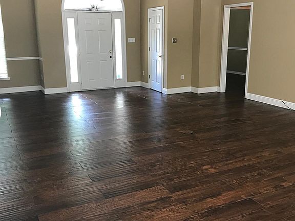 Living room walk in front door to this open floor plan