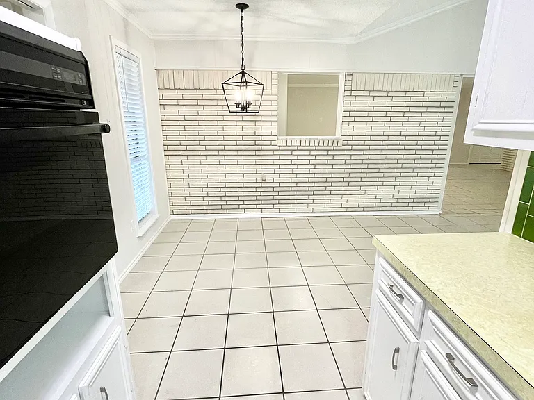 Kitchen with view of eat-in kitchen area