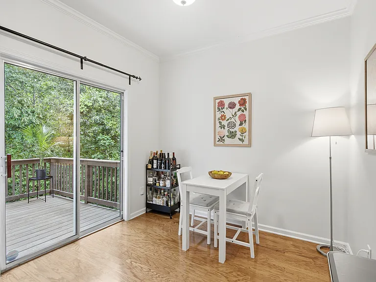 Breakfast nook beside kitchen, facing outdoor patio