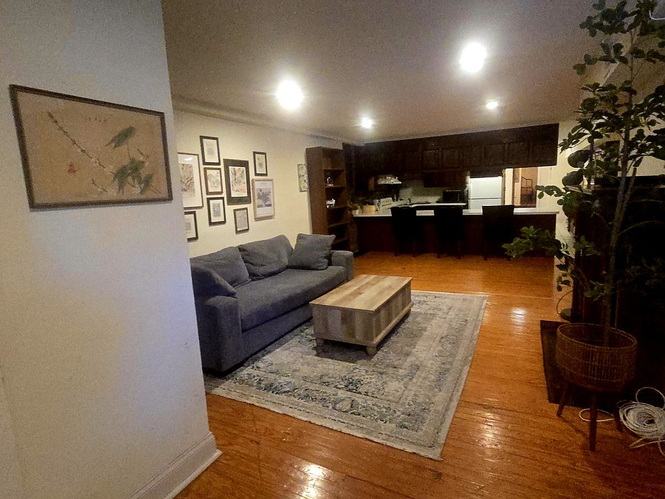 View as you enter. The eat-in Kitchen, with its wide counter top,is visible in the center of the photo. It is a very nice space.