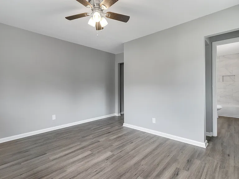 Master bedroom into master bath