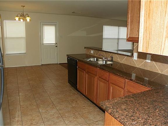 Very open floor plan for family to interact in the kitchen, breakfast room and family room.