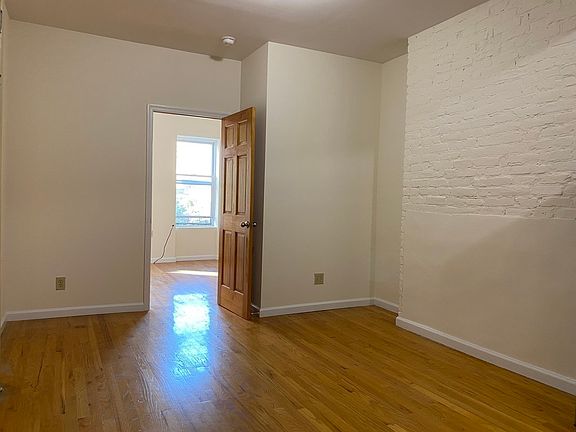 5th image of 107 E 2nd St APT 16