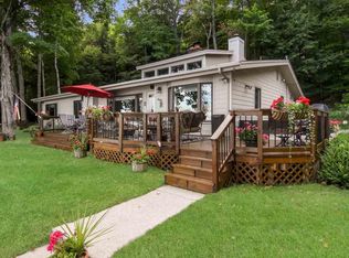 10117 SW Torch Lake Dr, Rapid City, MI 49676