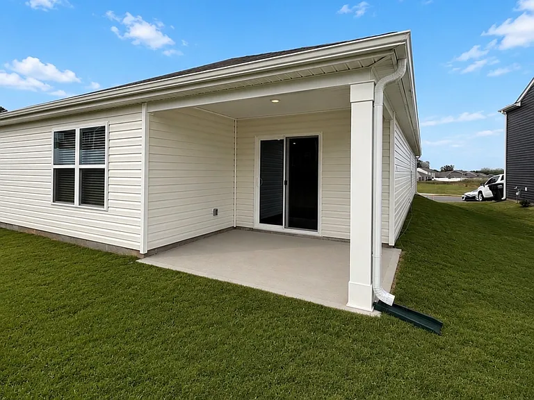 Property features a covered patio.