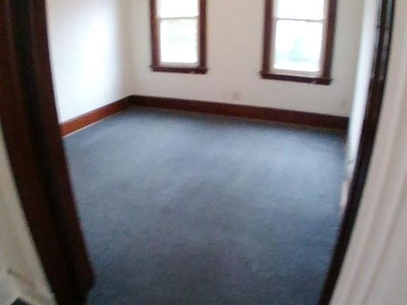 Large living room with ceiling fan