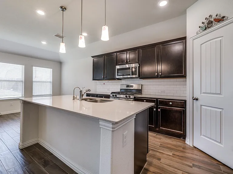 Kitchen with stainless steel appliances. Refrigerator included!