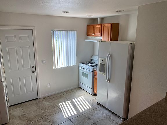 Gas stove, refrigerator with ice maker
