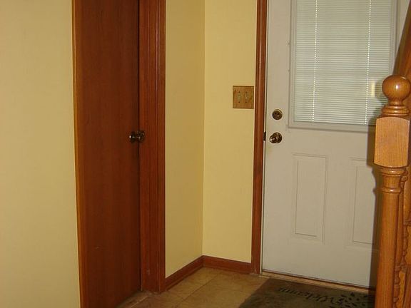 br /The front entry.br /The closed door is he 1/2 bathroom.