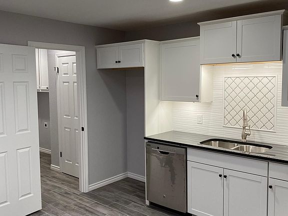 Kitchen with Door leading to Laundry Room