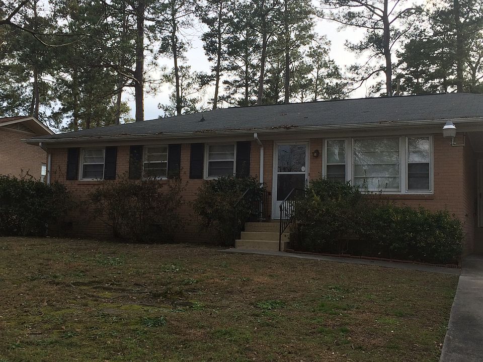 All brick with large yard