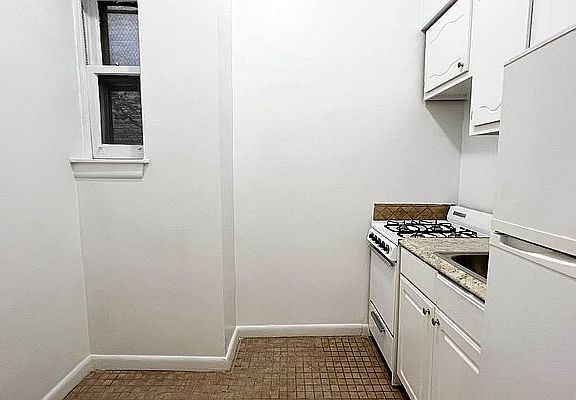 5th image of 411 E 83rd St APT 1