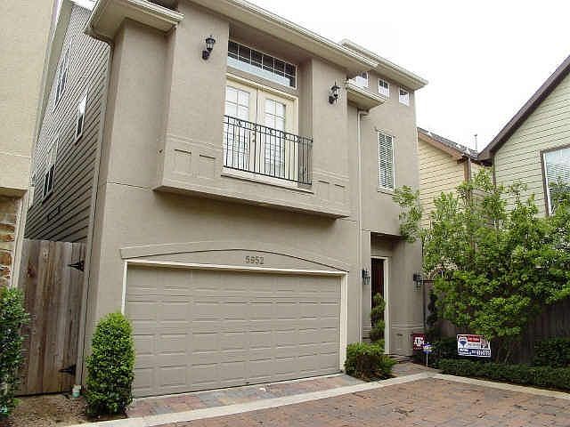 lovely elevation with solid mahogany door, french doors open to balcony
