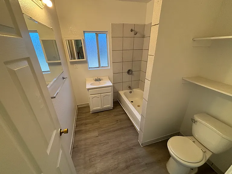 9415 S San Pedro St — Photo 6