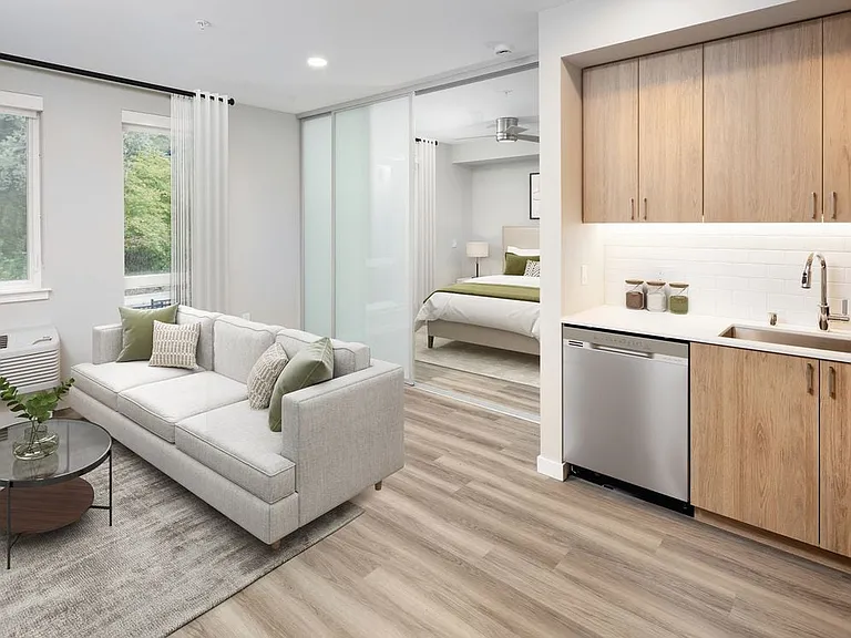 Kitchen and living room with hard surface flooring