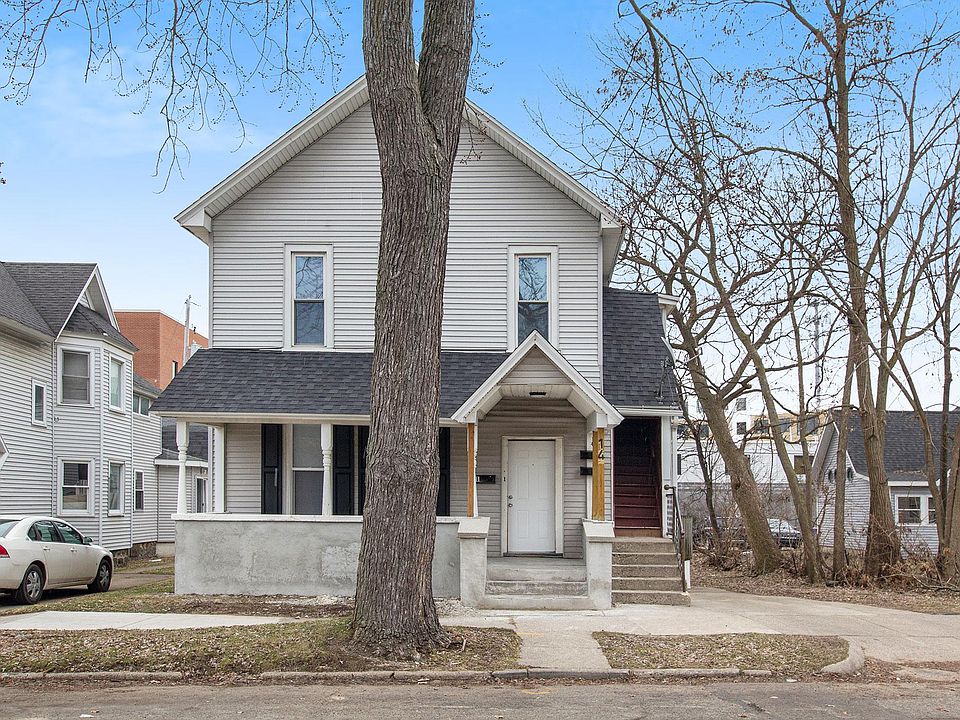 Front of home. This unit is the white door in the front with porch.