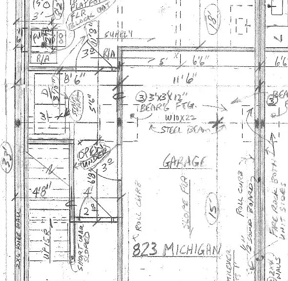 Basement Walkout level showing entrance, garage, utility room with washer and dryer, and unfinished