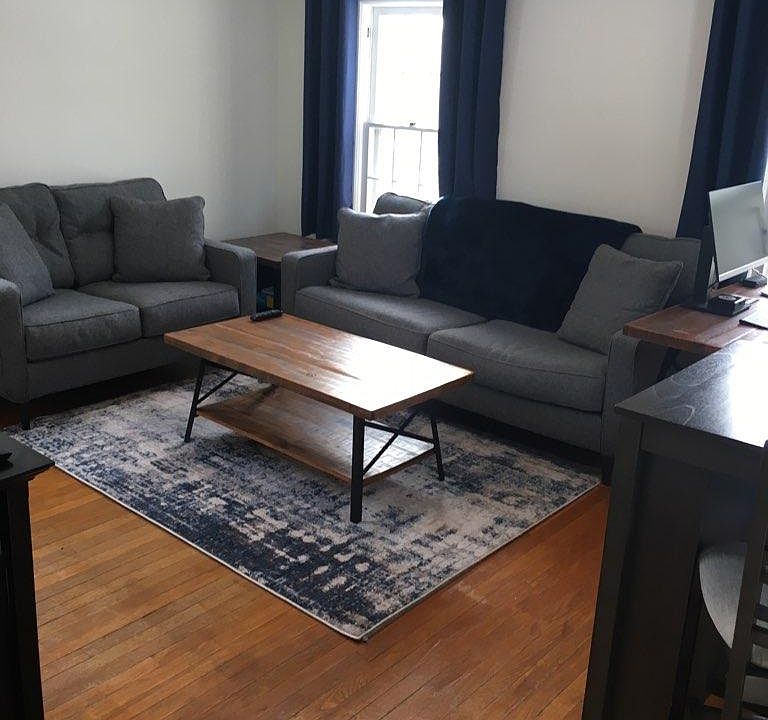 Living room with hardwood floors.