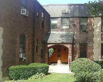 Brick Tudor Style 2 Story Building