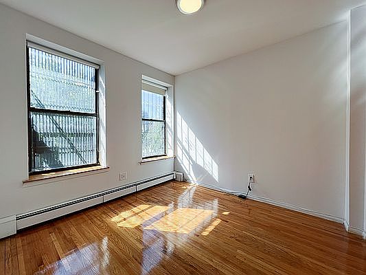 1st image of 417 E 12th St APT 3A