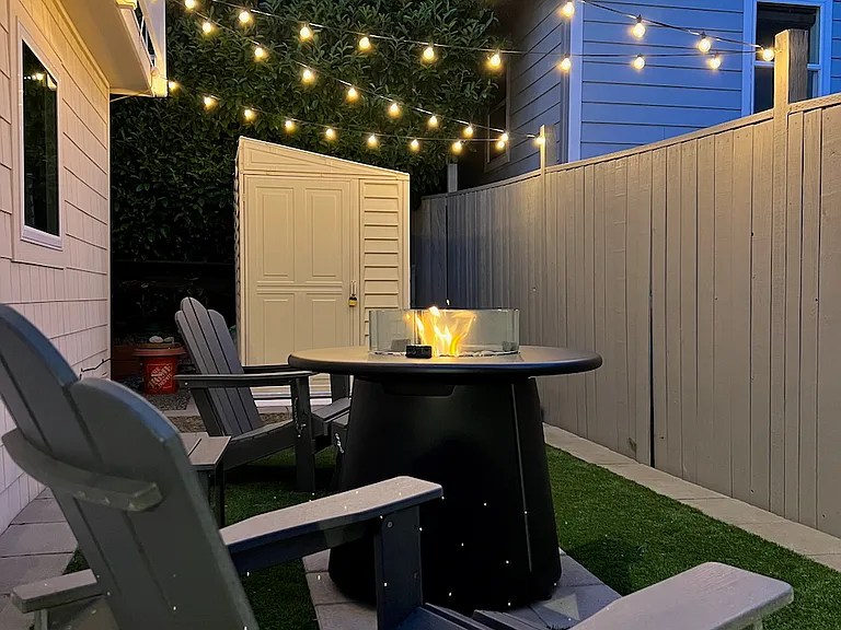 TIKI fire pit and Adirondack chairs