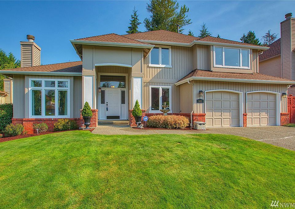 Another View Up Close.  You will love the Fountain outside the office window.  Newer Roof and Ready for you to move in.