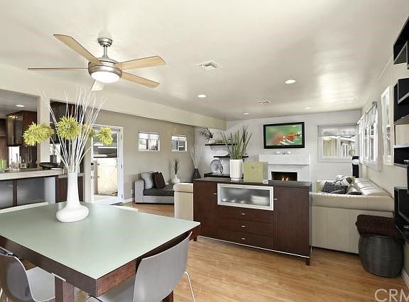 Looking into the living room, dining area and breakfast bar