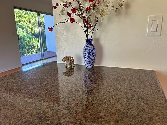Wide kitchen countertop for dual prep and dining.