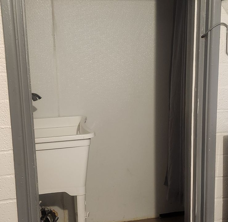 Pantry/closet with sink