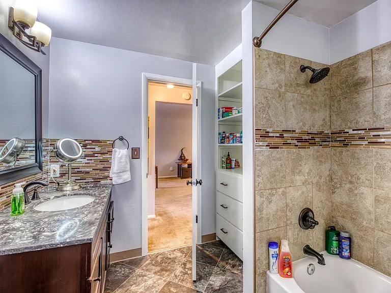 Large, beautiful bathroom with shower and tub. Starter supplies provided.