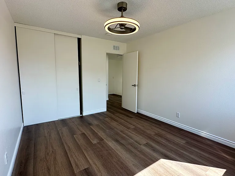 Bedroom 3, new flooring, modern ceiling fan