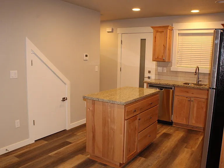 View from Nook of Kitchen, Entryway, and Under Stairs Storage
