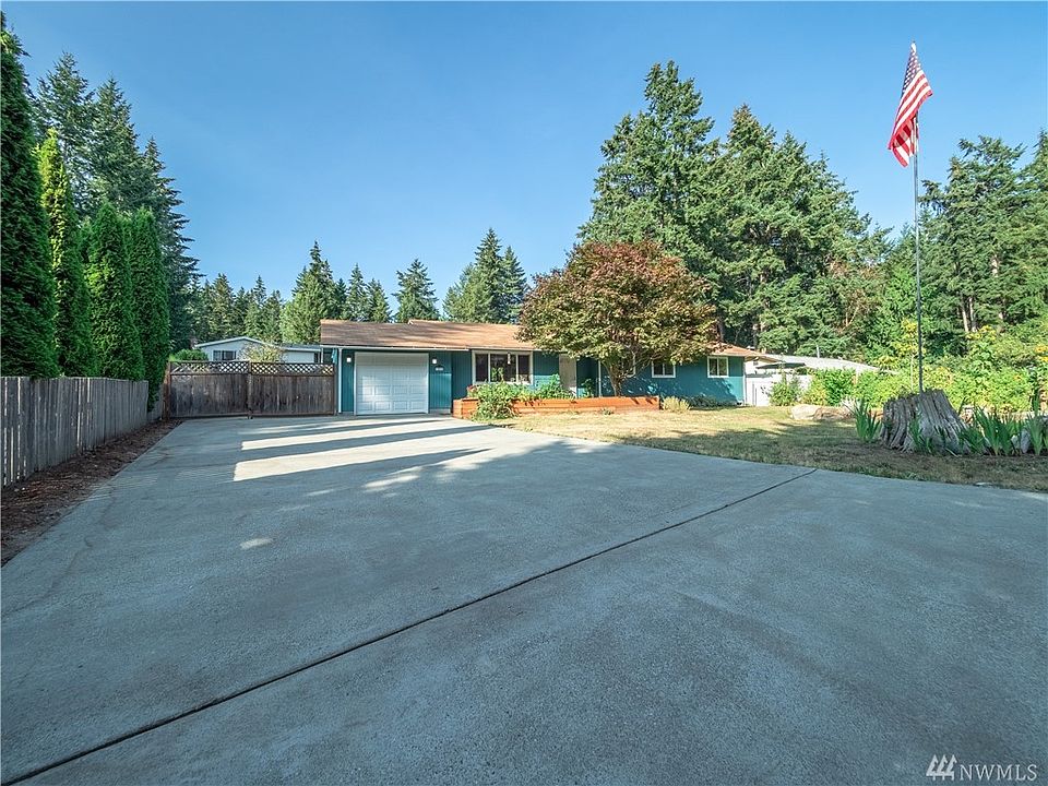 A beautiful rambler situated well back from the neighborhood road. Features Gated RV Parking (24' x 15' pad) and spacious concrete driveway (84' x 34.5').