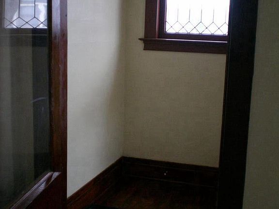 Foyer, programmable thermostat.