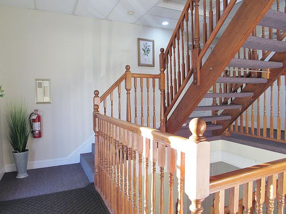 Beautiful open foyer with wide stairs to the 3rd floor