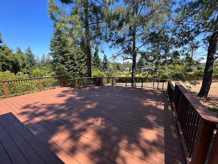 A inviting outdoor deck beckoning for entertainment or relaxation