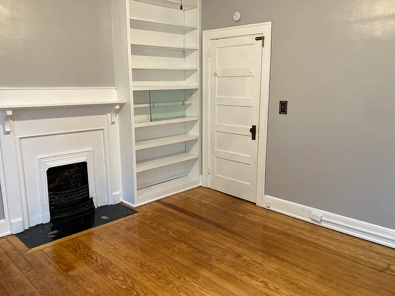 Bedroom with built in bookcase