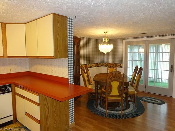 Kitchen with slider to enclosed porch