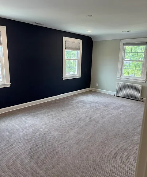 The two (2) upstairs bedrooms are ample size and have closets with built-ins