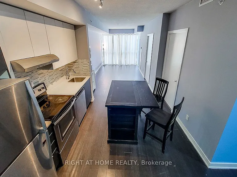 5260 Dundas St #306 — Photo 13
